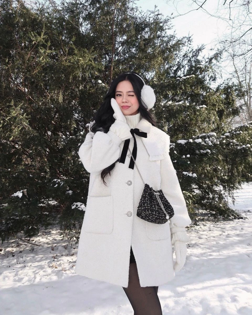 Chic White Coat with Luxe Accessories