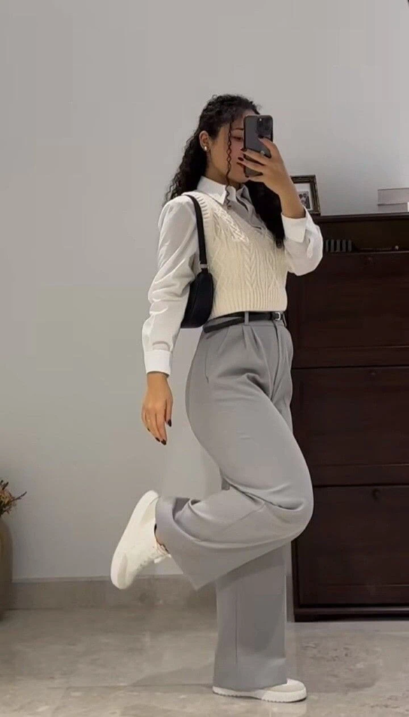 Cream Vest Over Crisp White Shirt