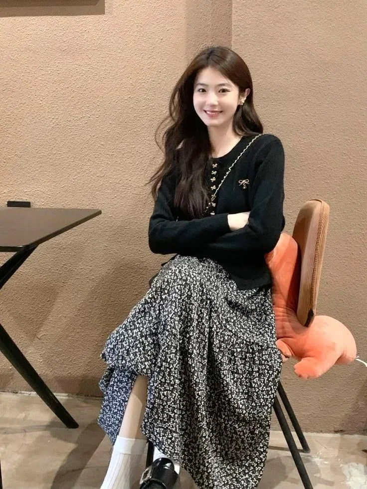 Black Sweater and Patterned Midi Skirt