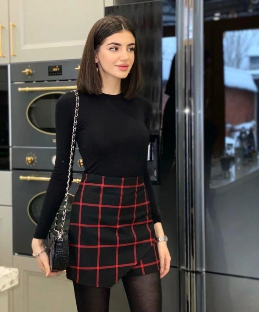 Red Plaid Skirt with Black Long-Sleeve Top