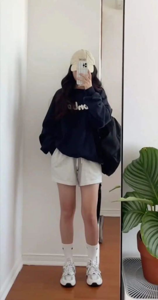 Sporty Chic: Oversized Sweatshirt and Shorts