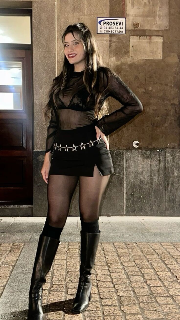 Edgy Black Sheer Top with Studded Belt