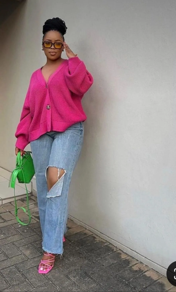 Bold Pink Cardigan with Distressed Denim