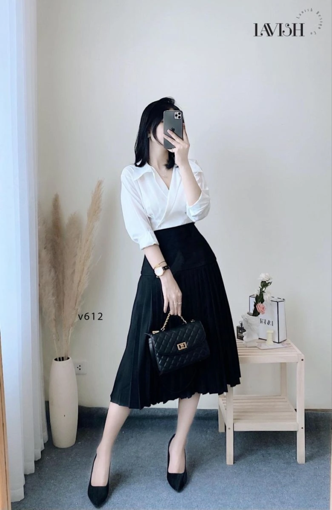 Classic White Blouse and Black Pleated Skirt
